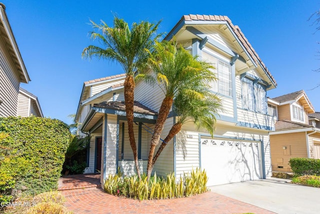 view of front of property featuring a garage