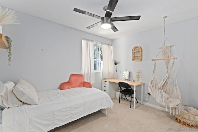 bedroom featuring ceiling fan and carpet flooring