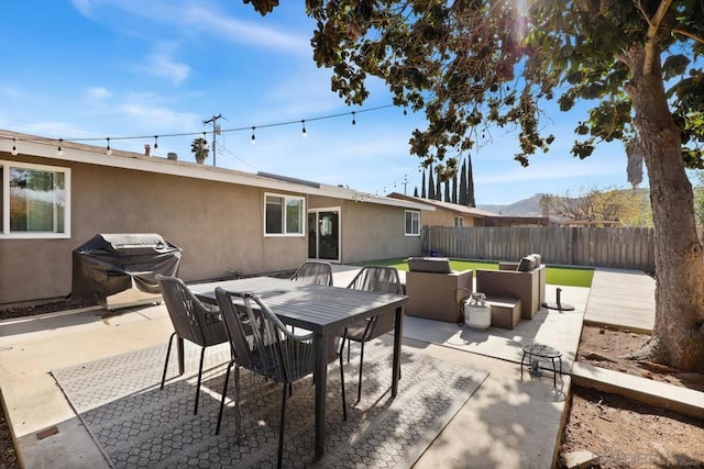 view of patio / terrace with area for grilling and an outdoor hangout area