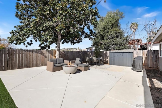 view of patio / terrace with an outdoor fire pit