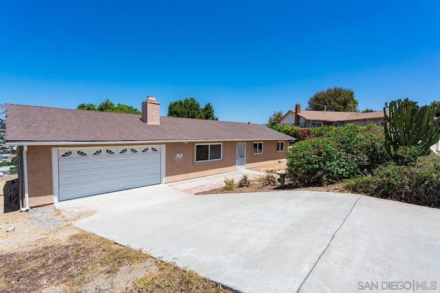 single story home with a garage