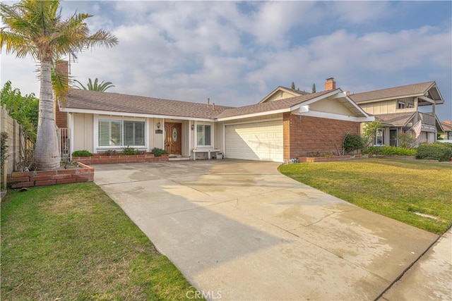 ranch-style house featuring a garage and a front yard