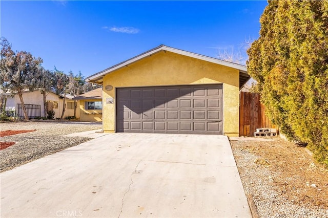 ranch-style home with a garage