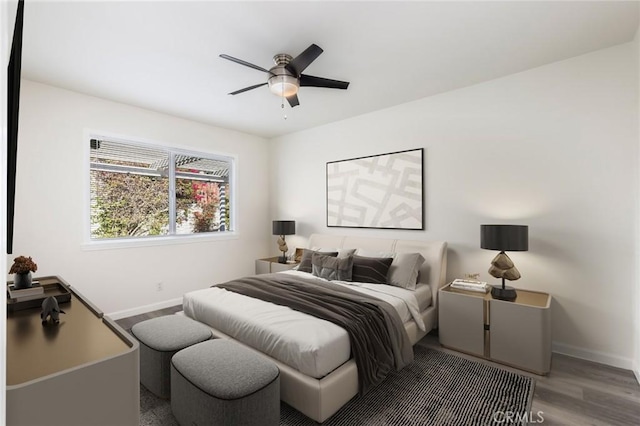 bedroom featuring ceiling fan and wood-type flooring