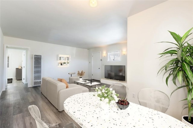 dining space featuring hardwood / wood-style floors