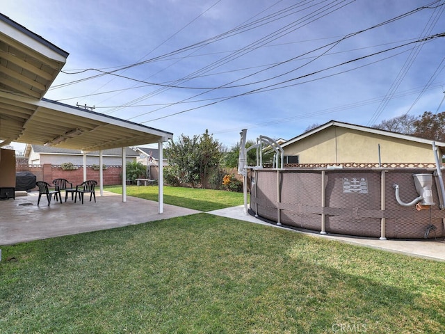 view of yard with a patio area