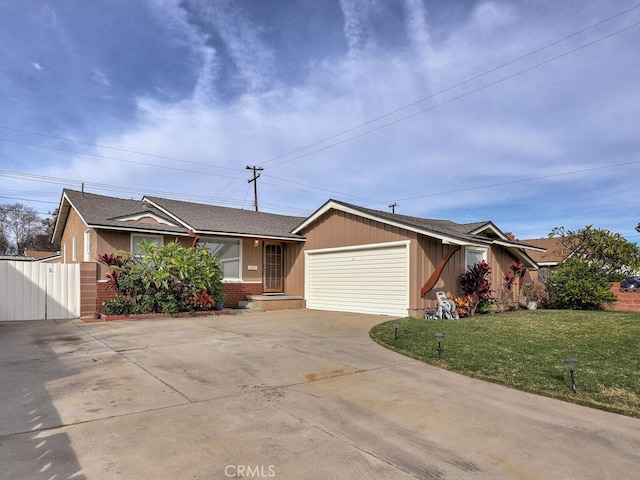 ranch-style home featuring a garage and a front yard