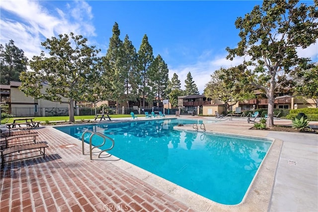 view of pool featuring a patio area