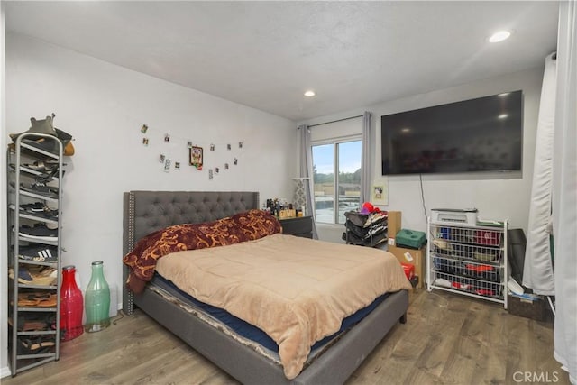 bedroom featuring hardwood / wood-style floors