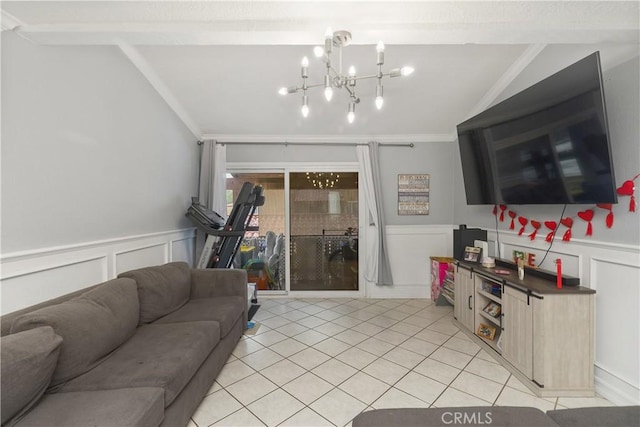 living room featuring lofted ceiling, an inviting chandelier, and light tile patterned floors