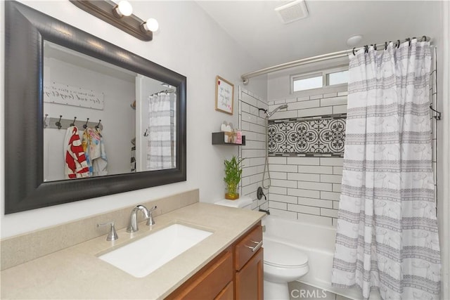 full bathroom featuring toilet, vanity, and shower / bathtub combination with curtain