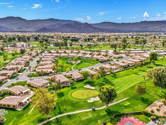 birds eye view of property featuring a mountain view