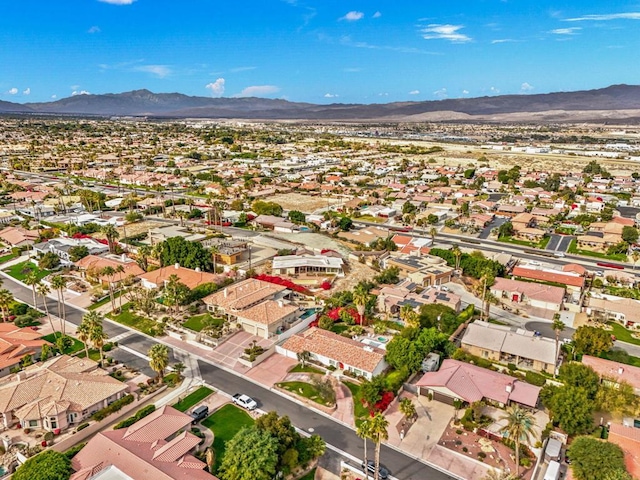 birds eye view of property featuring a mountain view