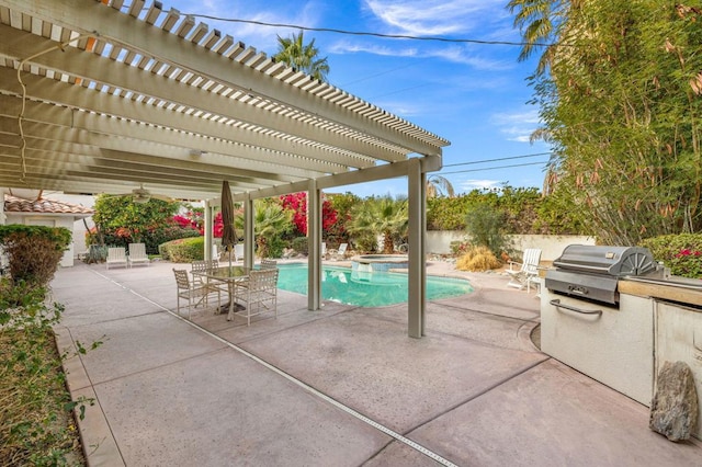 view of patio with area for grilling, an in ground hot tub, and a pergola