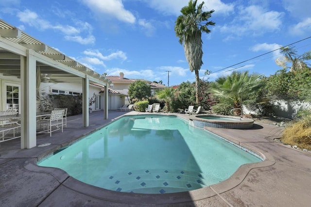 view of pool with an in ground hot tub, a patio area, and a pergola