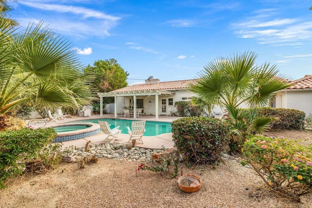 view of swimming pool featuring a patio, an in ground hot tub, and a pergola