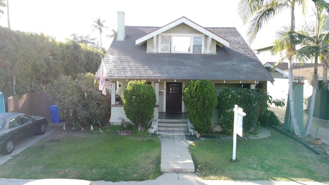 view of front of property with a front lawn