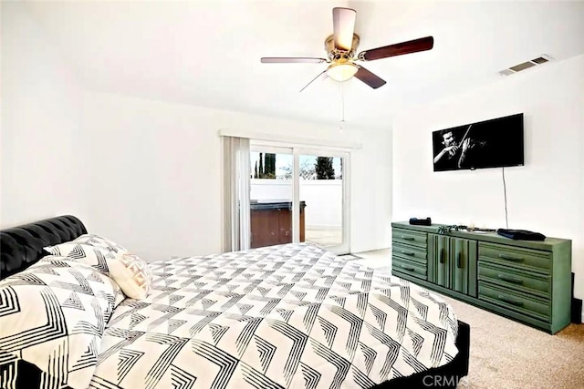 bedroom with light carpet, ceiling fan, visible vents, and access to exterior