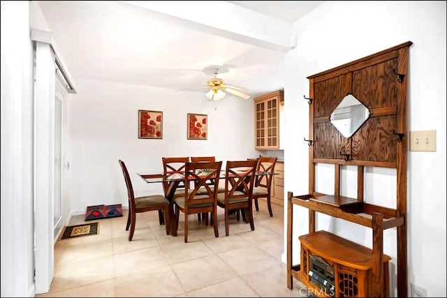 dining room featuring light tile patterned flooring and ceiling fan