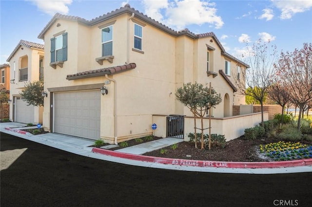 view of property exterior featuring a garage