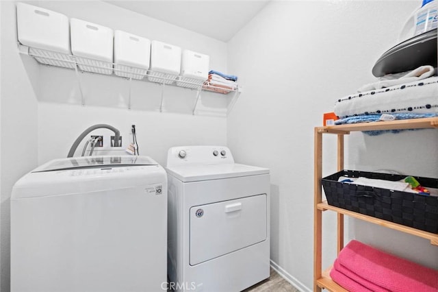 washroom featuring separate washer and dryer