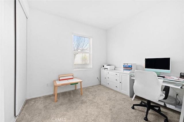 home office with light colored carpet