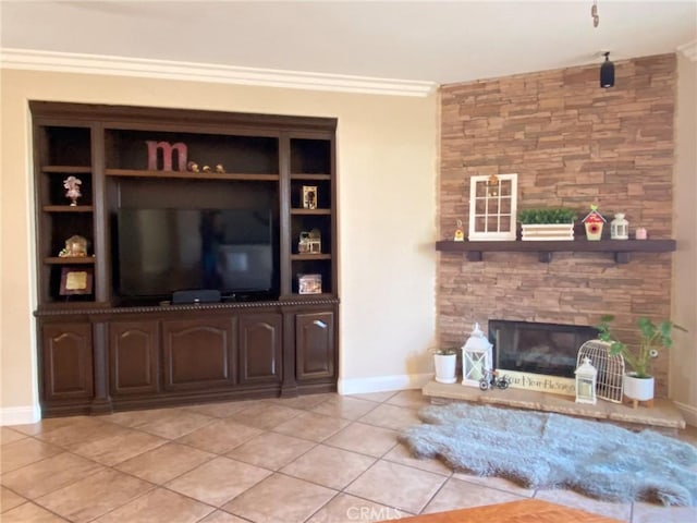 tiled living room with a stone fireplace and ornamental molding