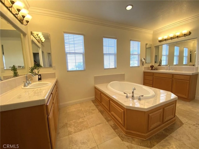 bathroom featuring a tub to relax in, vanity, and crown molding