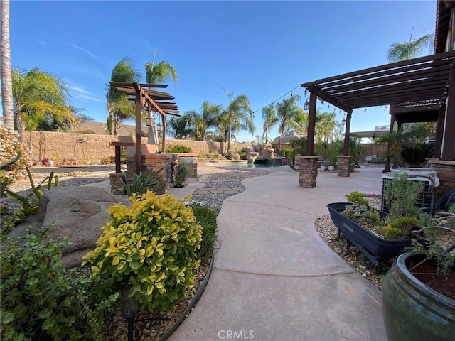 view of patio featuring cooling unit and a pergola