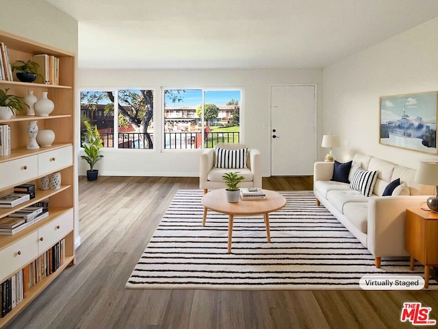 living room with dark wood-type flooring