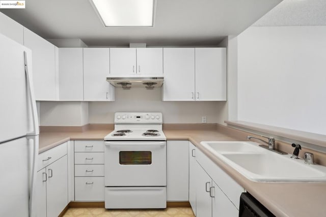 kitchen featuring sink, white appliances, and white cabinets