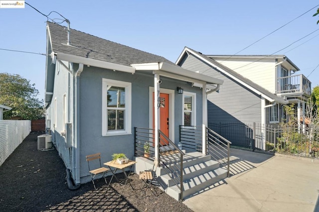 view of front of home with cooling unit