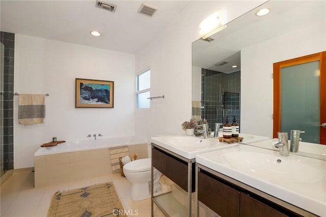 full bathroom featuring tile patterned flooring, vanity, plus walk in shower, and toilet