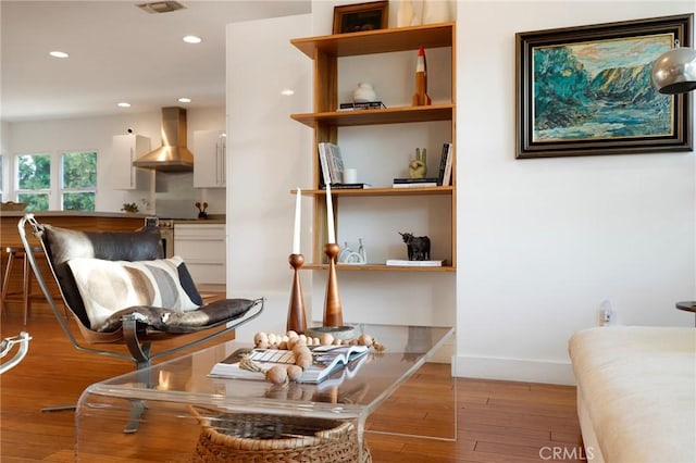 living area with light hardwood / wood-style flooring