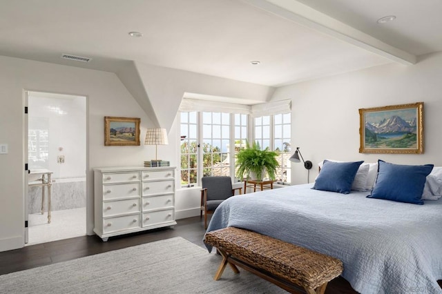 bedroom featuring dark hardwood / wood-style flooring