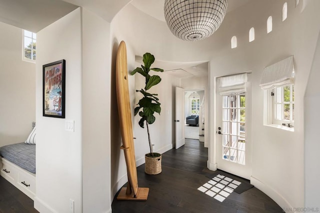 hallway featuring dark wood-type flooring