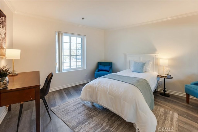 bedroom featuring dark hardwood / wood-style flooring and ornamental molding