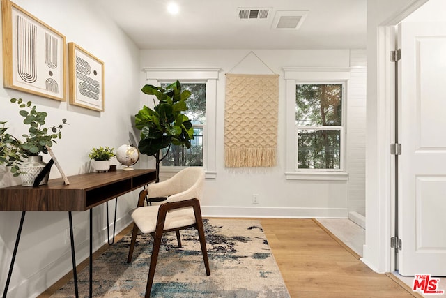 home office featuring hardwood / wood-style flooring