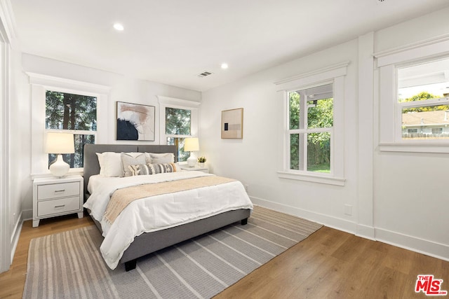 bedroom featuring hardwood / wood-style flooring