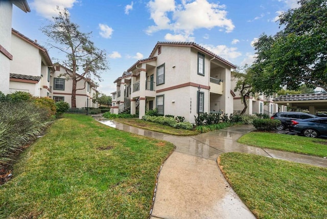 exterior space with a lawn