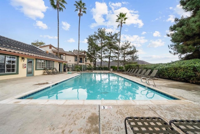 view of pool featuring a patio area