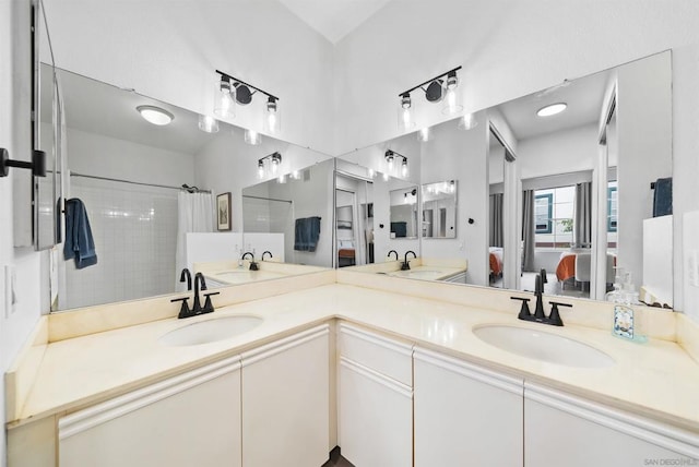 bathroom featuring vanity and walk in shower