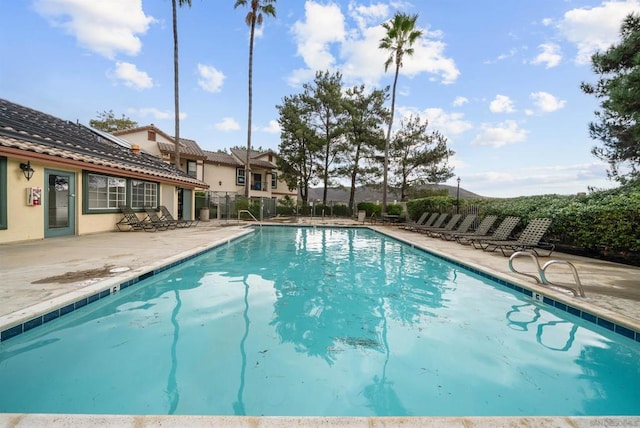 view of pool featuring a patio area