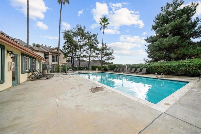 view of pool with a patio