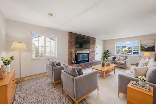 living room with a brick fireplace