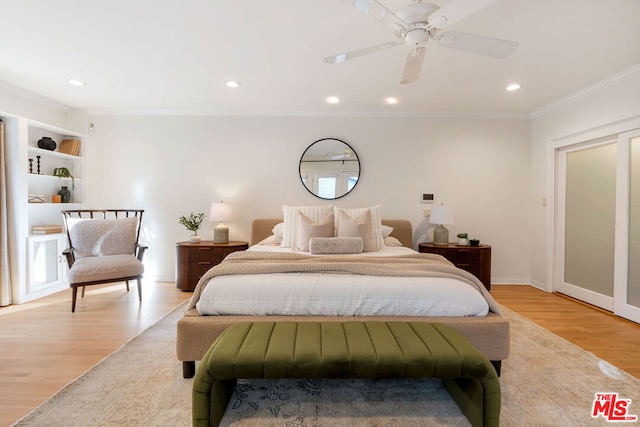 bedroom featuring ornamental molding, ceiling fan, and light hardwood / wood-style flooring