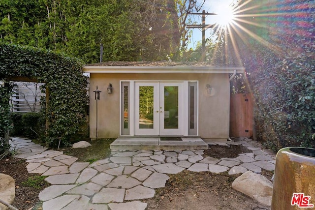 view of outbuilding with french doors