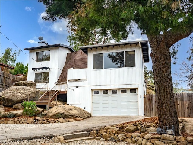 view of front of property with a garage