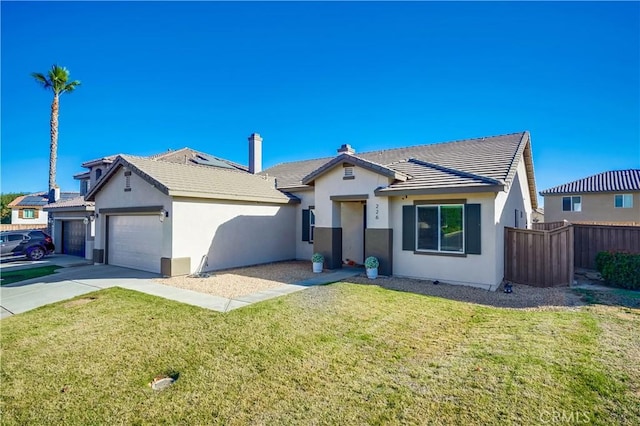 ranch-style home featuring a garage and a front yard