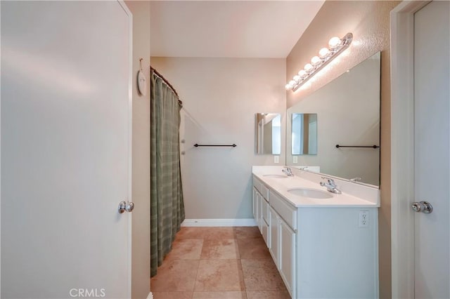 bathroom with a shower with curtain and vanity